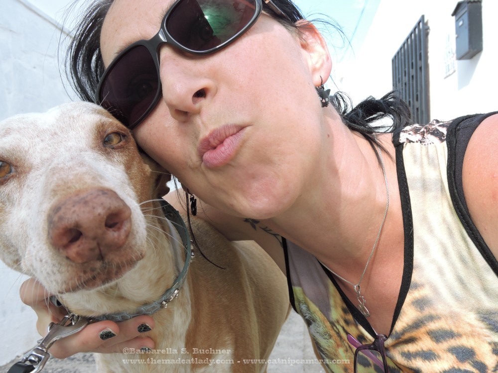 SCANDAL!!!! The Mad Cat Lady Posts Selfies of … KISSING A DOG!